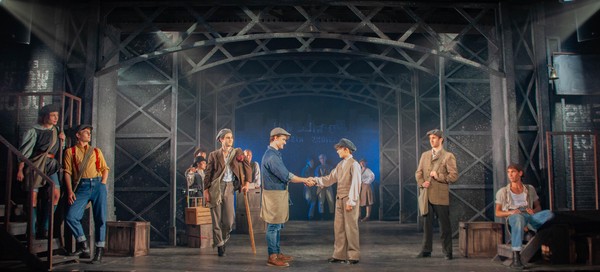 Carl Robinett in Newsies (Carrying The Banner Scene 2)